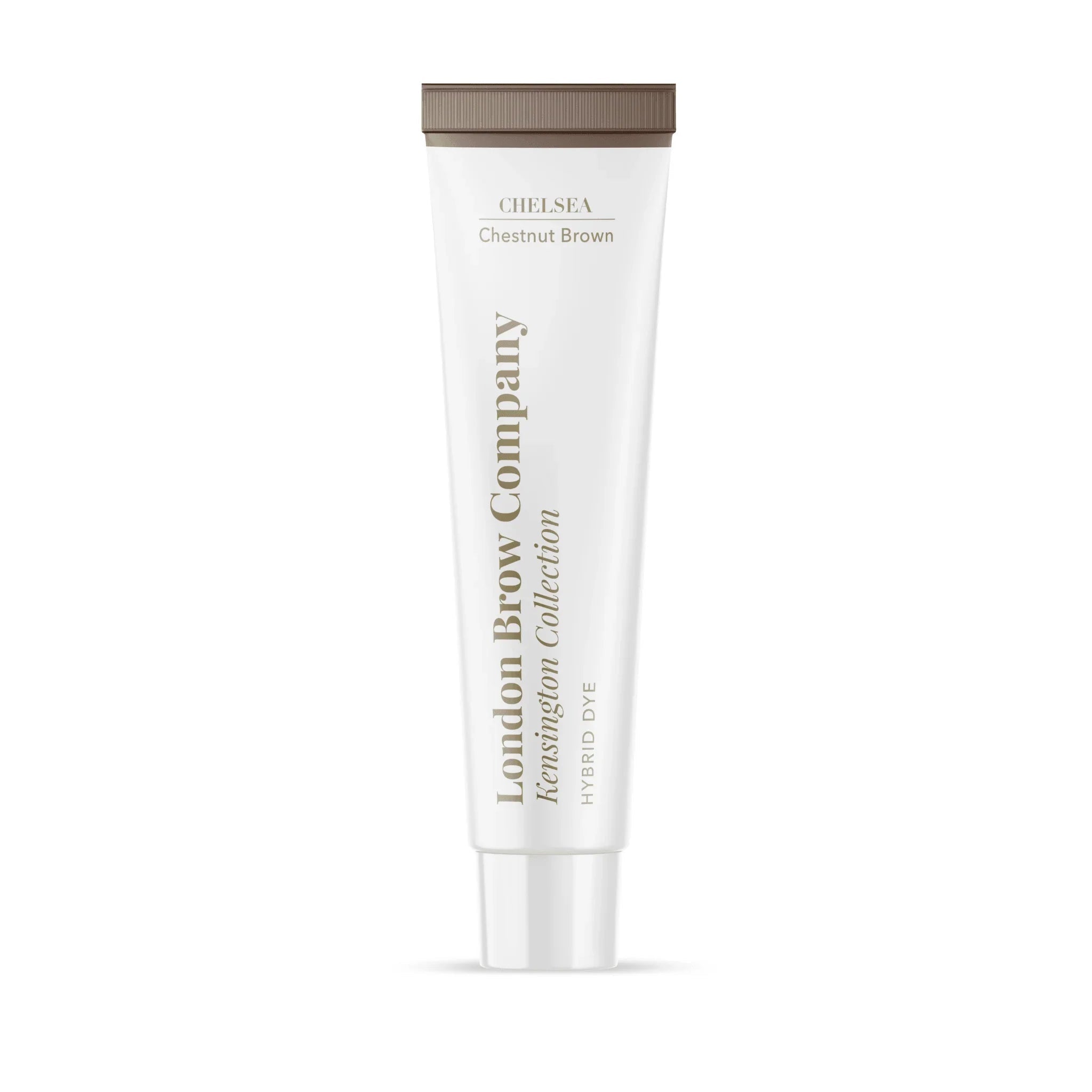 The London Brow Company Kensington Collection Hybrid Dye lifestyle shot showing shade tubes and developer bottle with mixing accessories on white tray from diagonal angle on cream background