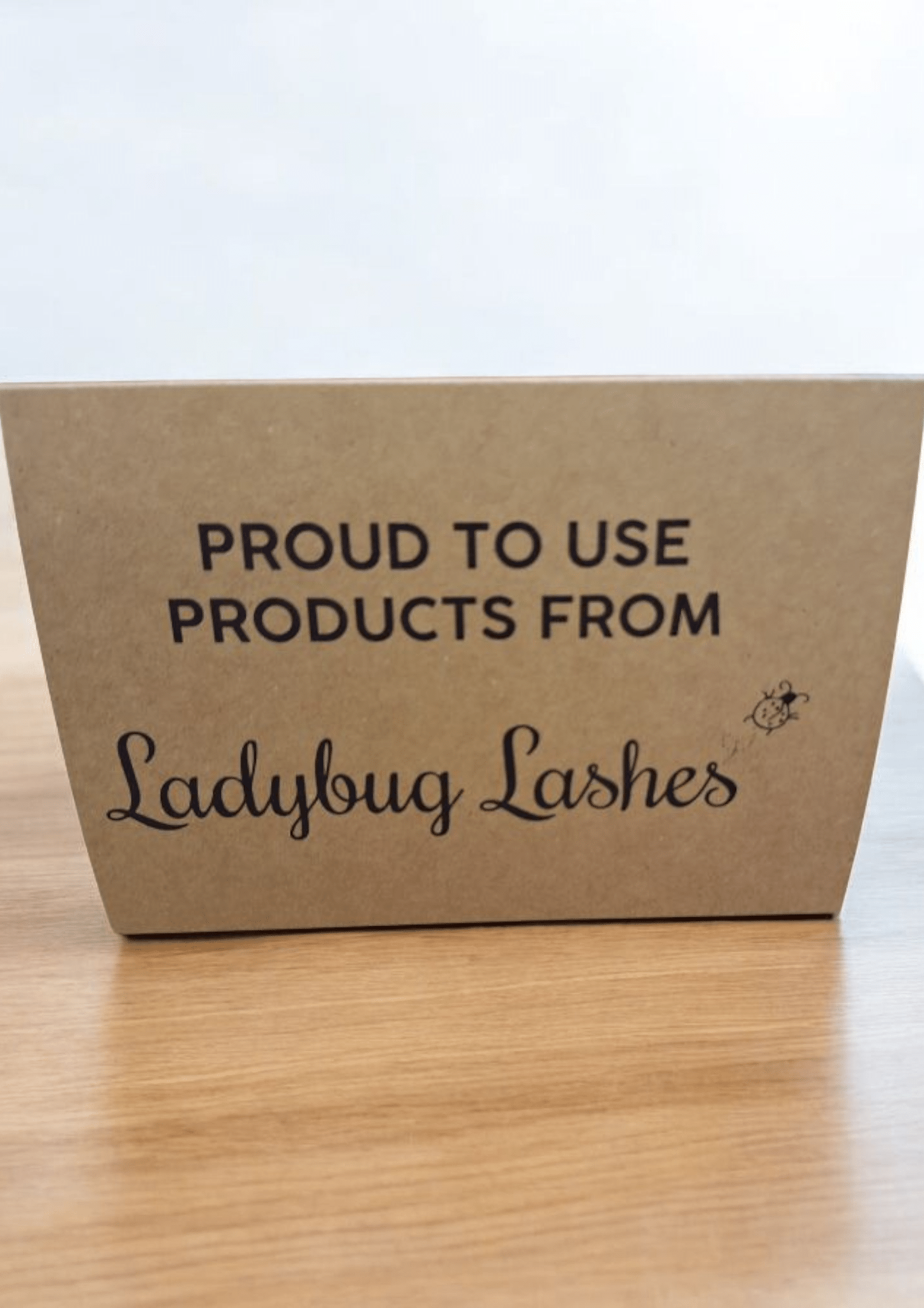 Proud to Use LadybugLashes Product Display Sign