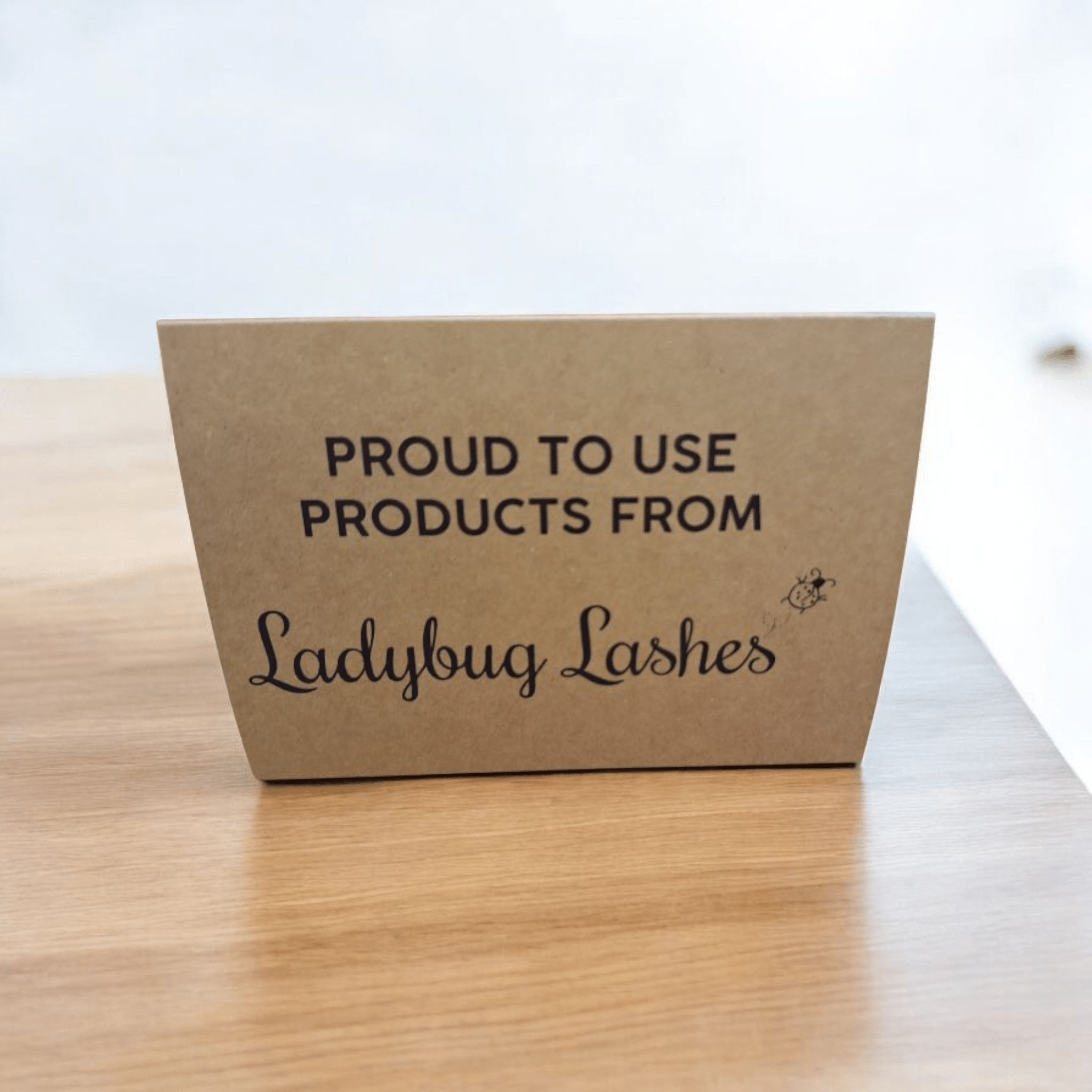 Proud to Use LadybugLashes Product Display Sign