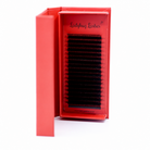 Ladybug Lashes 10D Clover Lash open product shot showing 16 rows of ultra black 10D clover lash fans in red Ladybug Lashes branded packaging from diagonal front angle
