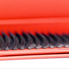 Close-up of Ladybug Lashes 10D Clover lash bases showing dense curl structure and skinny bases against red box