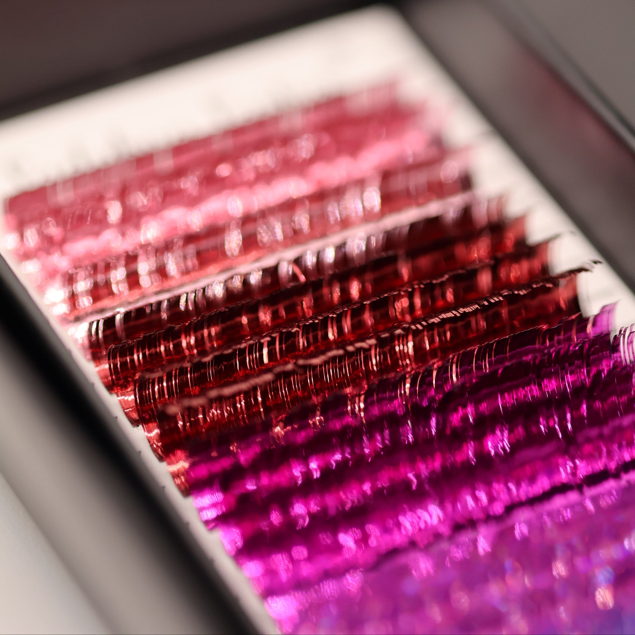 Close-up of Ladybug Lashes YY and Tinsel Lash Collection showing individual tinsel lash shimmer and curl definition