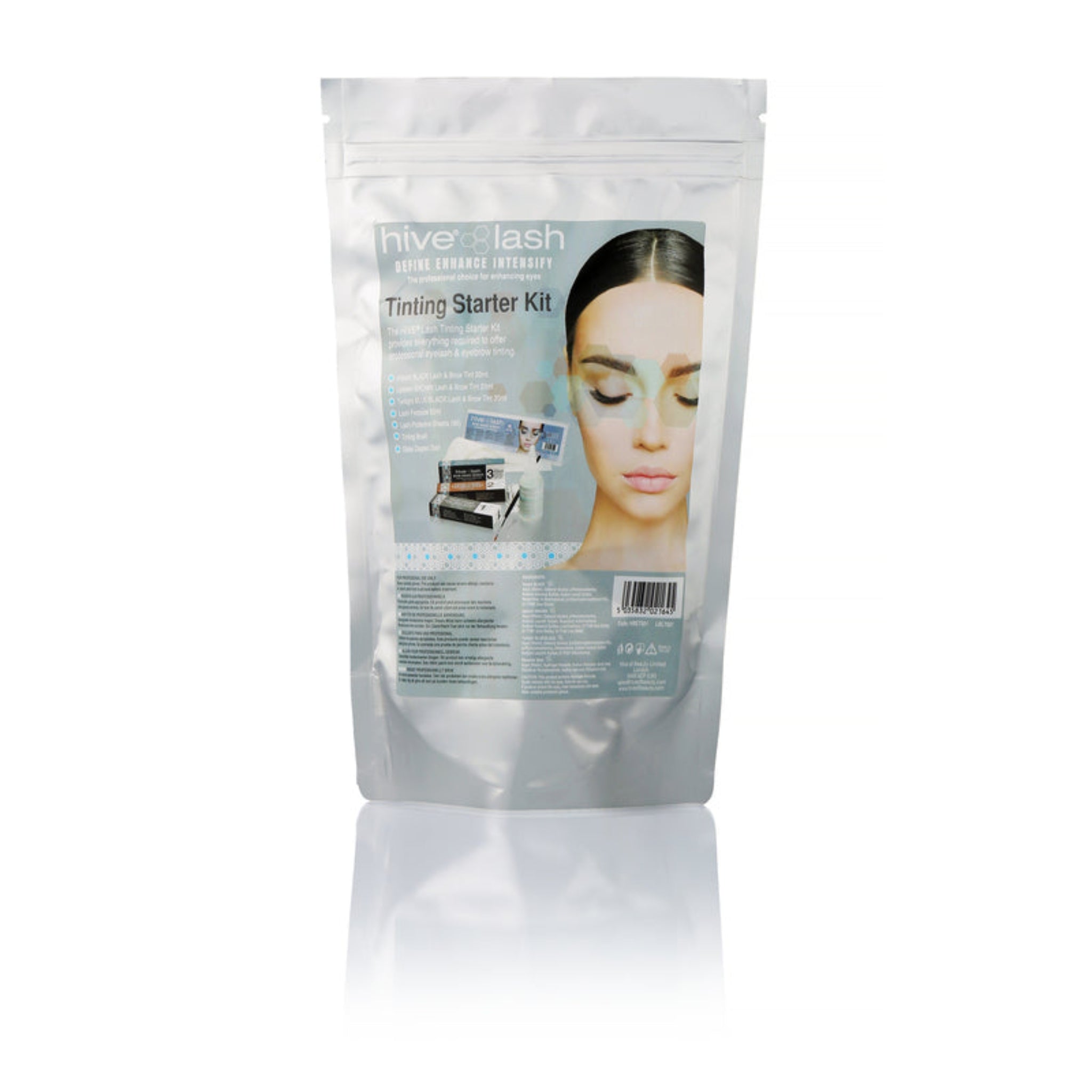 Hive Lash Define Enhance Intensify Eyelash Tinting Starter Kit retail packaging shot showing silver resealable foil stand-up pouch with Hive Lash Tinting Starter Kit label and editorial portrait of dark-haired model with defined brows and closed eyes from front angle on white background