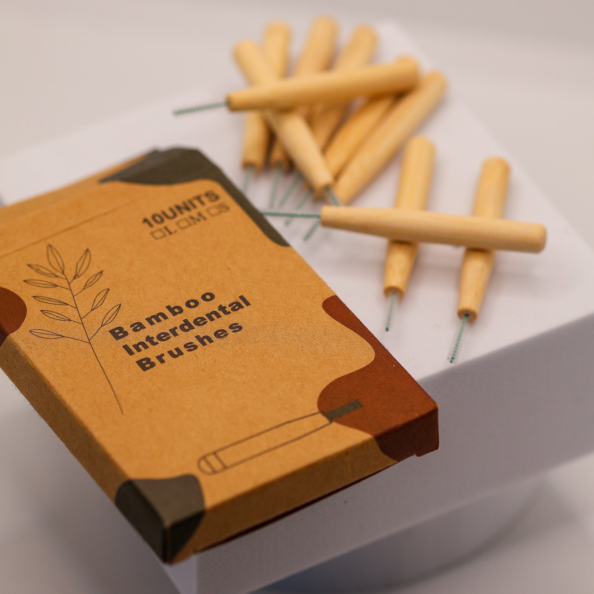 "Close-up of bamboo interdental floss heads – sustainable brow lamination tool – LADYBUGLASHES