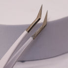 Close-up of LADYBUGLASHES Angled Volume Tweezers – smooth tip detail