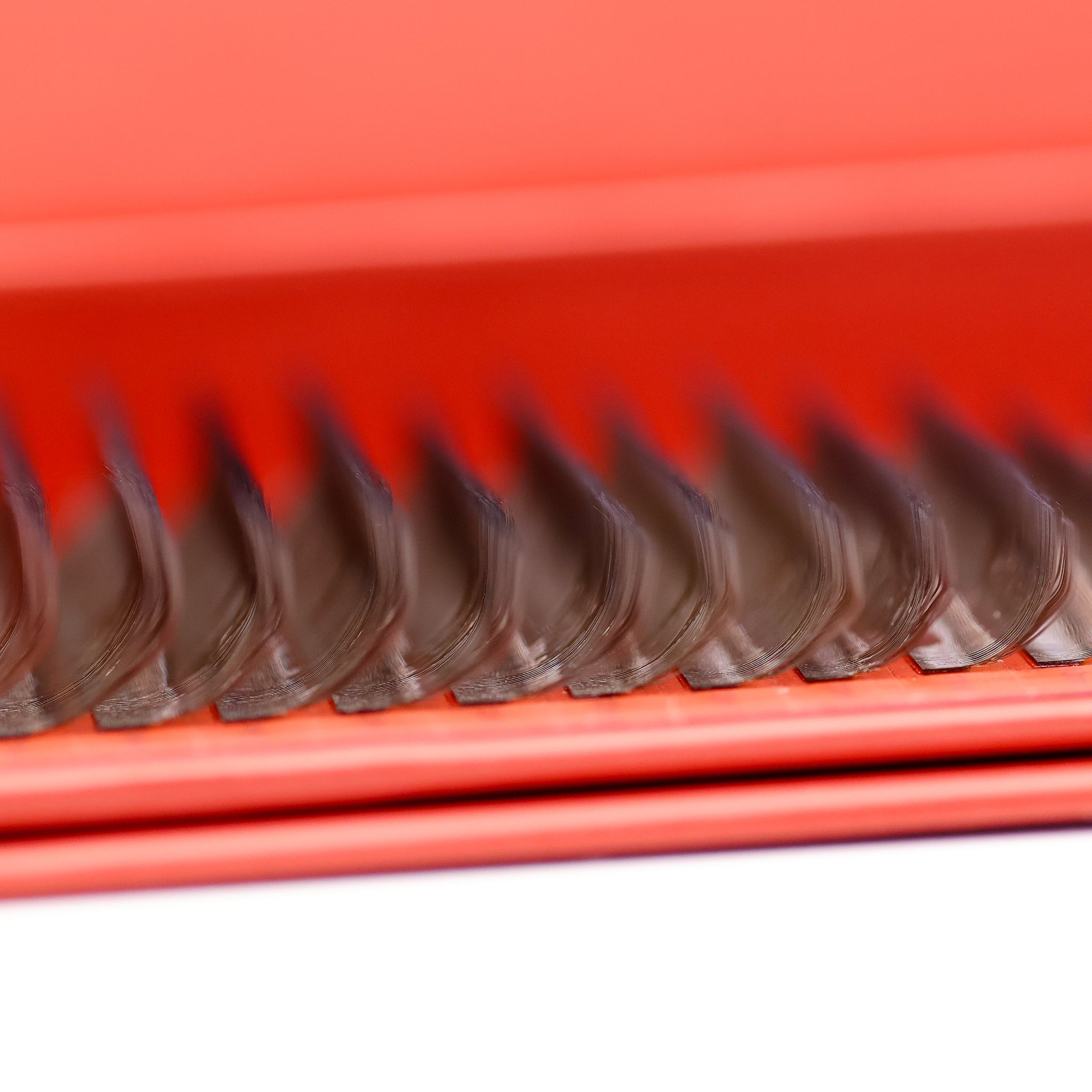 Close-up of Ladybug Lashes Brown 4D Clover fan tips showing soft warm brown fibres and curl structure from side angle