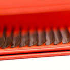 Ladybug Lashes Brown 4D Clover Tray extreme close-up side shot showing a single row of warm brown lash fans standing upright in an open red branded tray, curl definition visible from low angle