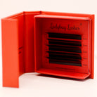 Ladybug Lashes Sample Tray 8D Clover open showing five rows of black CC curl fans in mixed lengths 10–14mm in red branded box from straight front view