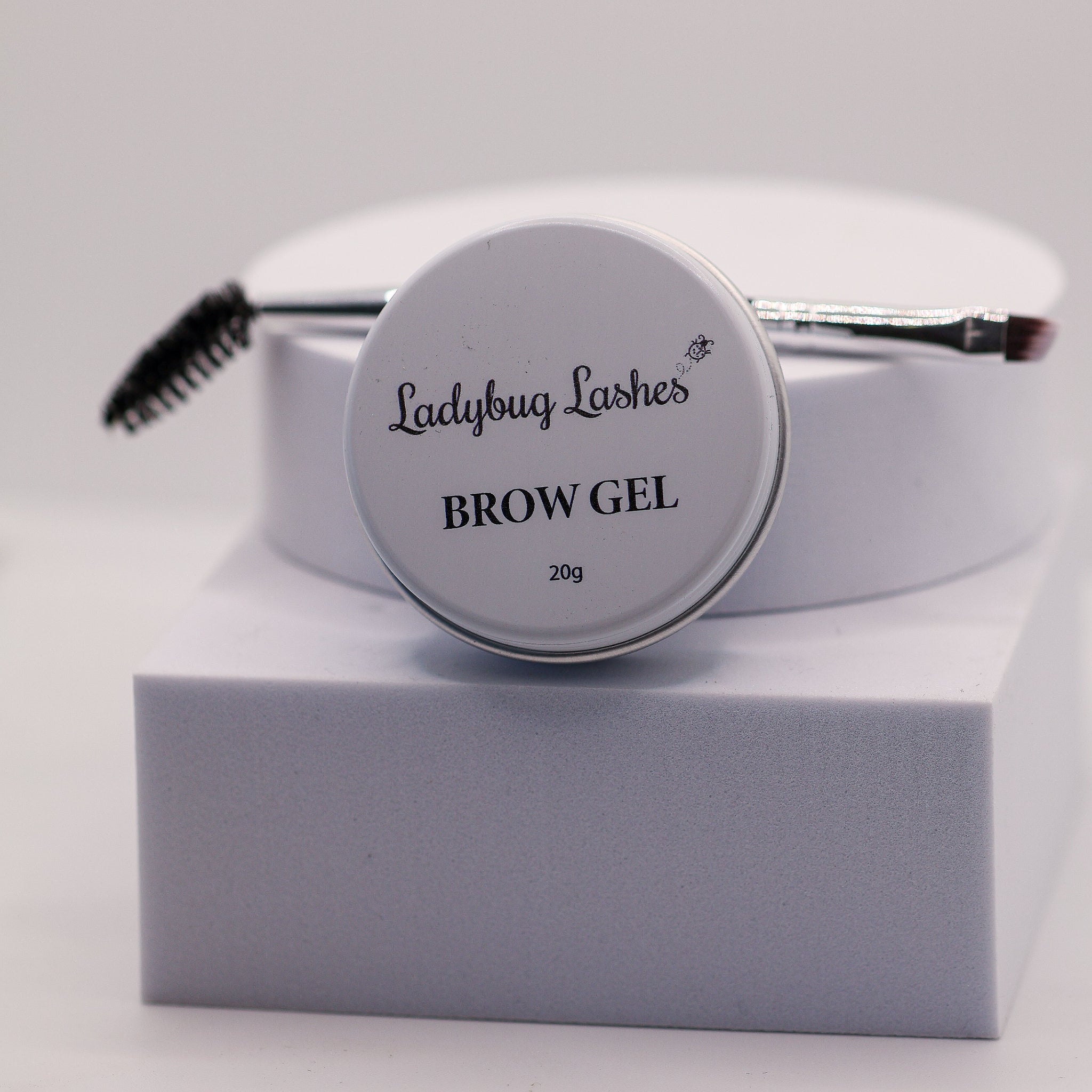 LADYBUGLASHES Brow Gel – close-up of product texture and applicator wand