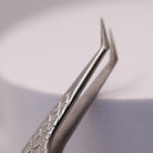 LADYBUGLASHES Angled Volume Tweezers – silver fibre grip, precision tip detail