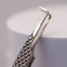 Close-up of LADYBUGLASHES Classic 90° Tweezers – fibre grip tip detail