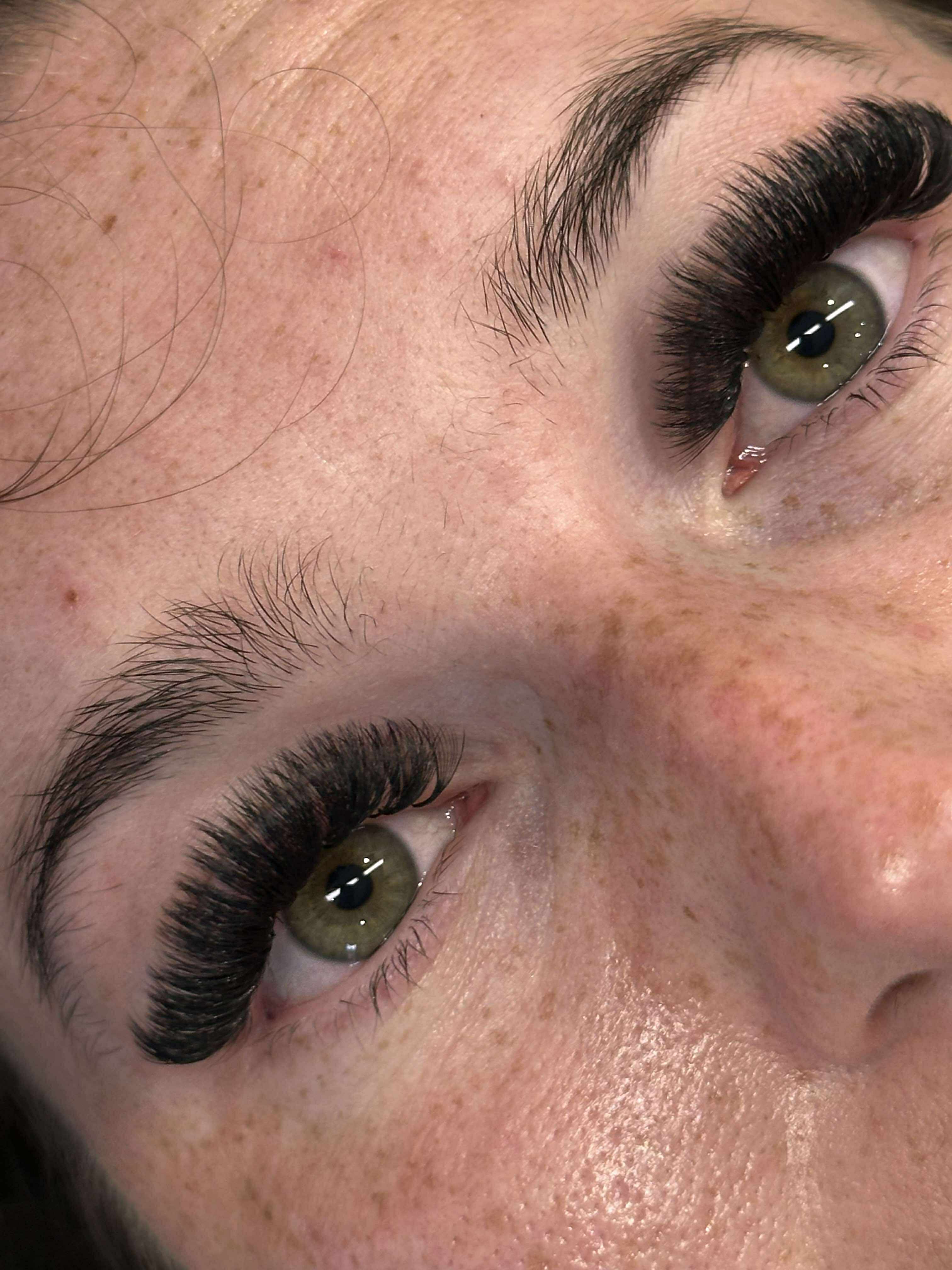 Close-up of a person's eyes with long eyelashes