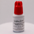 Wildflower Clear 5g lash adhesive bottle with a red cap. 0.5-1 Seconds Clear Glue. 