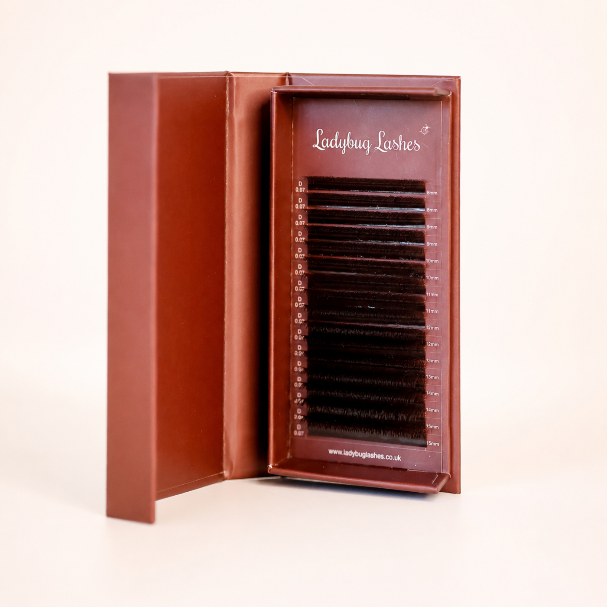 Ladybug Lashes Brown Fairy lash 16 row mixed tray in open burgundy box showing full D curl 0.07 brown lash strip from 8mm to 15mm straight-on view