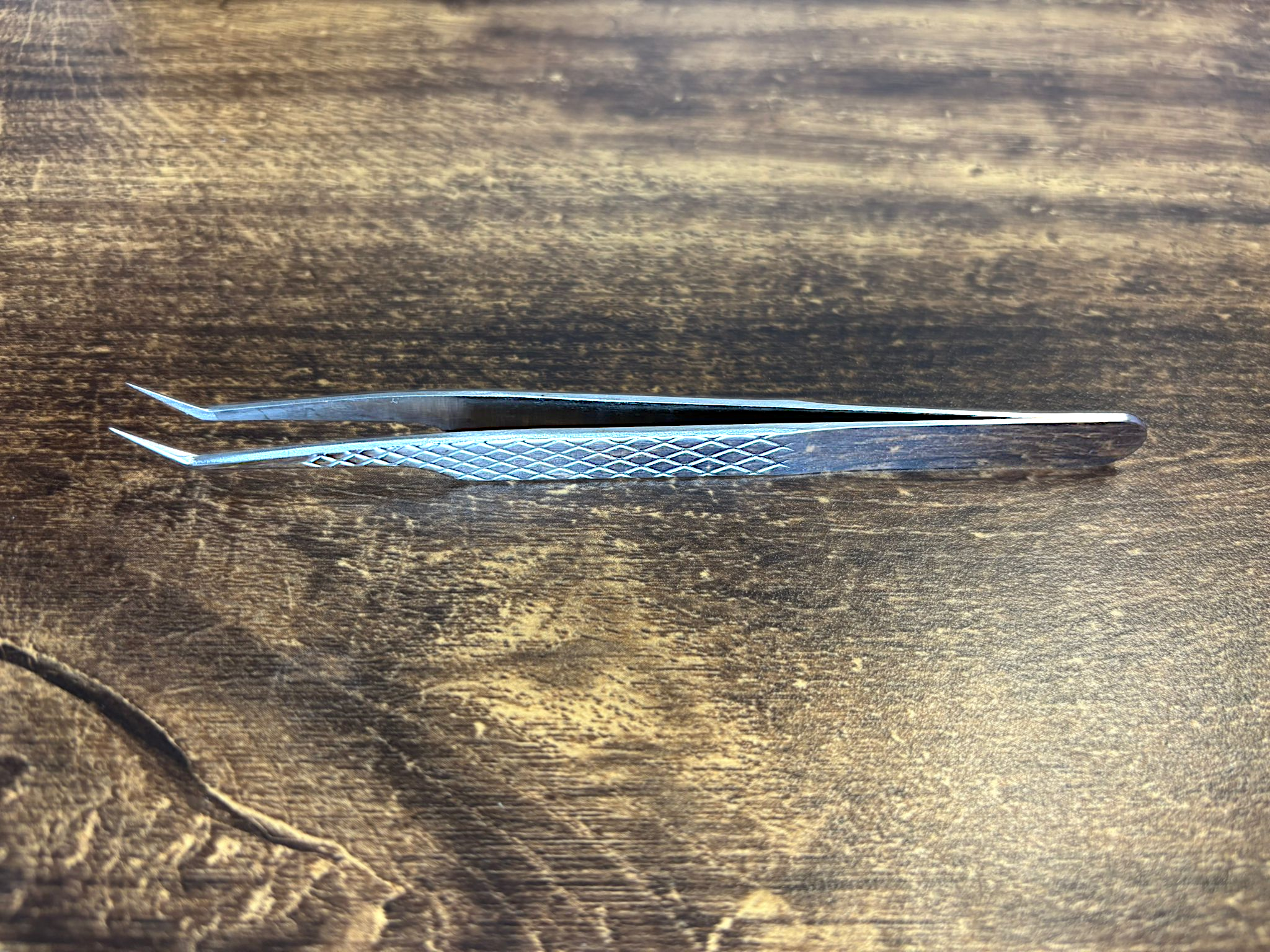 fan making angled fibre grip tweezers hand tested 