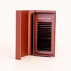 Ladybug Lashes Brown Fairy lash mixed tray in open burgundy box showing D curl 0.07 brown lash extensions from 8mm to 15mm angled side view