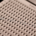 Close-up of Ladybug Lashes Platinum Promade Ultra Black fans showing skinny base and fan spread with tray edge