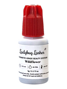 Bottle of Ladybug Lashes Wildflower product on a white background