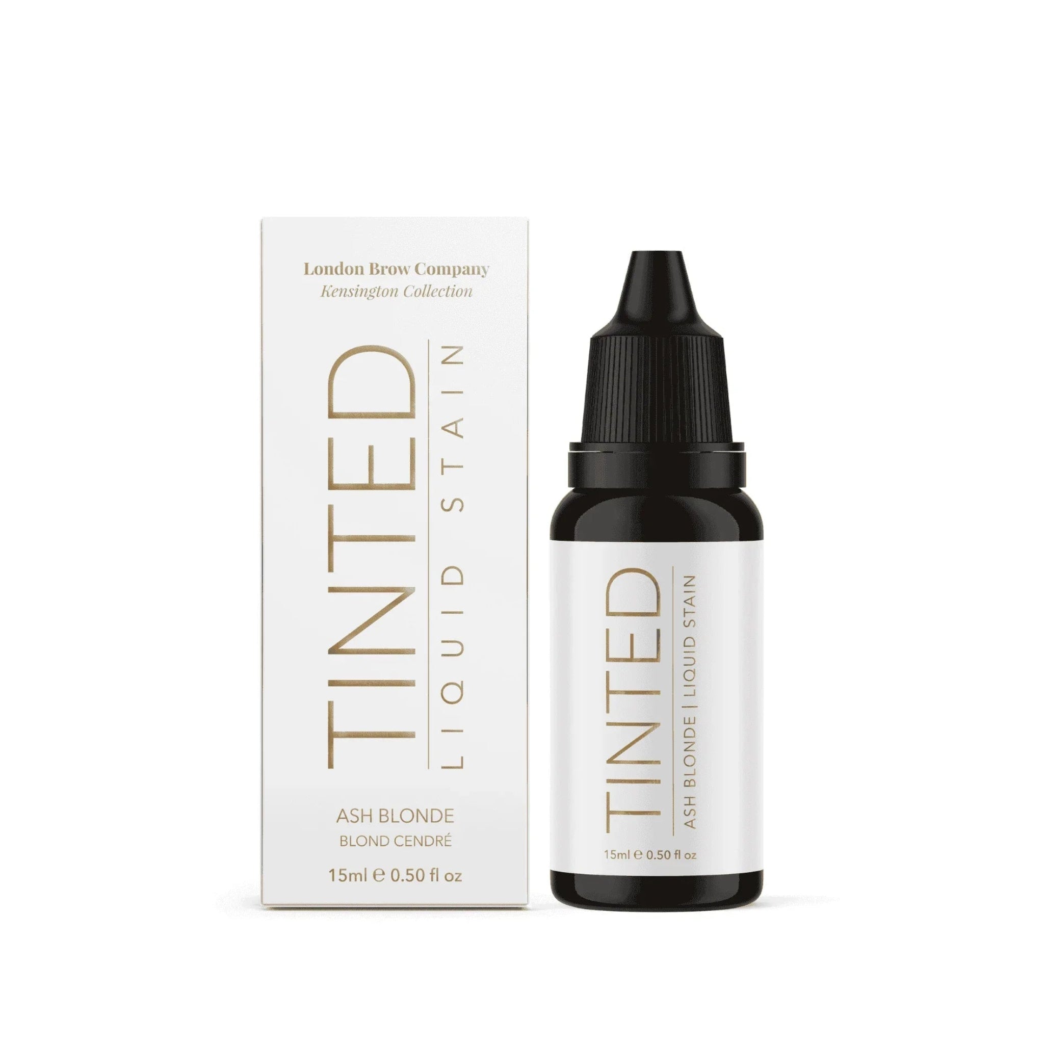 London Brow Company Kensington Collection Tinted Liquid Stain Ash Blonde shade product shot showing dark amber 15ml dropper bottle labelled Tinted Ash Blonde Liquid Stain alongside its white retail box labelled Ash Blonde Blond Cendré 15ml 0.50 fl oz from front angle on white background