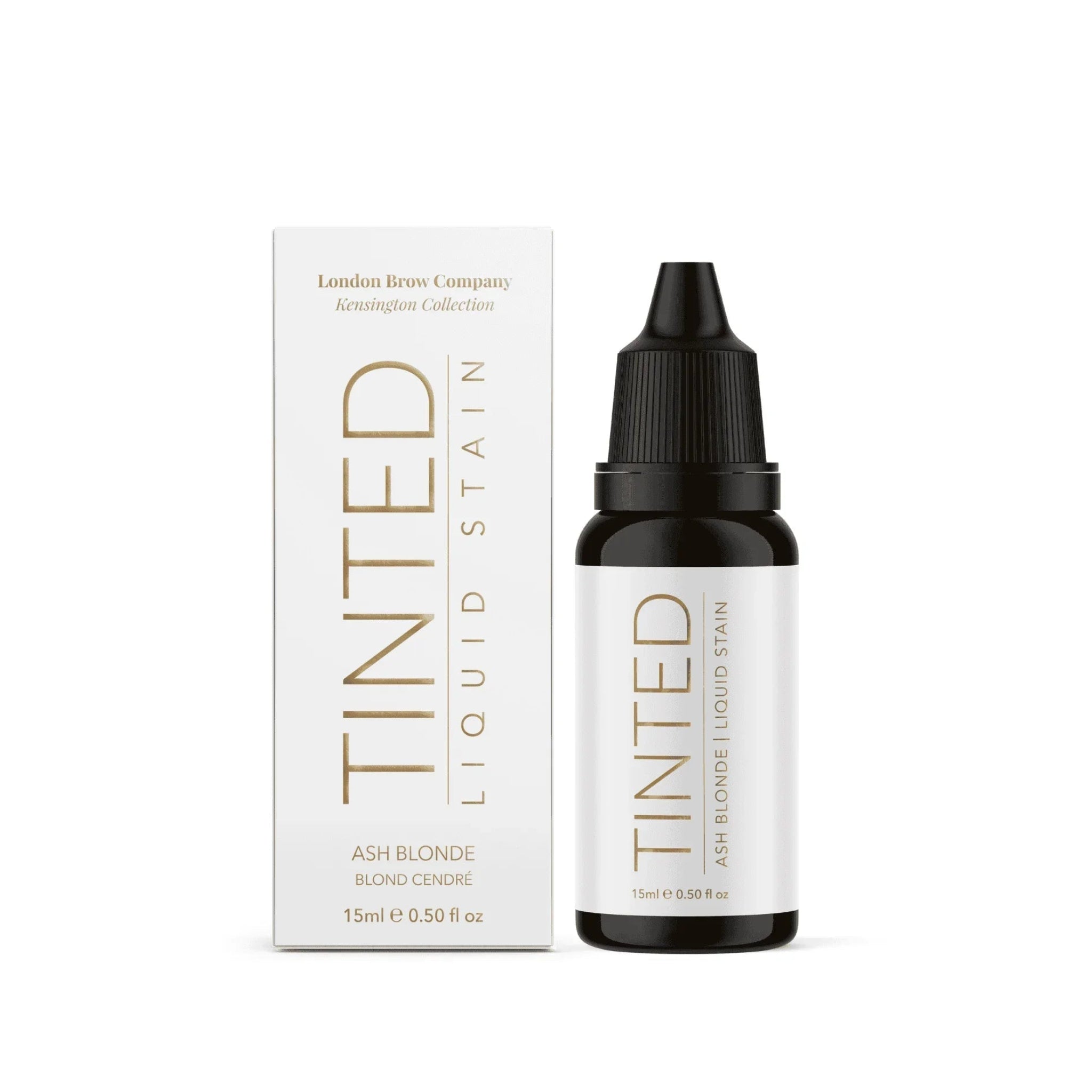 London Brow Company Kensington Collection Tinted Liquid Brow Stain 15ml Ash Blonde shade product shot showing dark amber glass dropper bottle labelled Tinted Ash Blonde Liquid Stain 15ml 0.50 fl oz alongside its white retail box labelled Ash Blonde Blond Cendré from front angle on white background