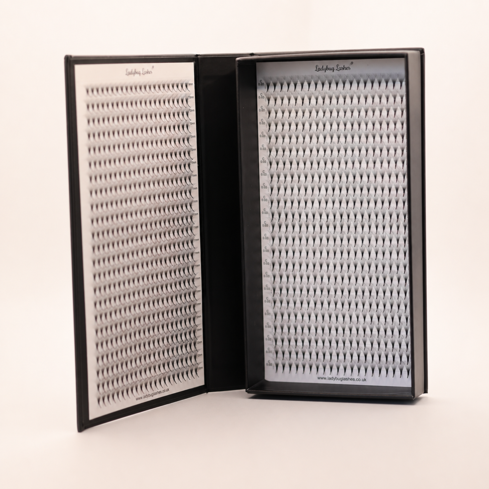 Ladybug Lashes Platinum Promade Tray Ultra Black open showing 920 fans across both panels angled side view